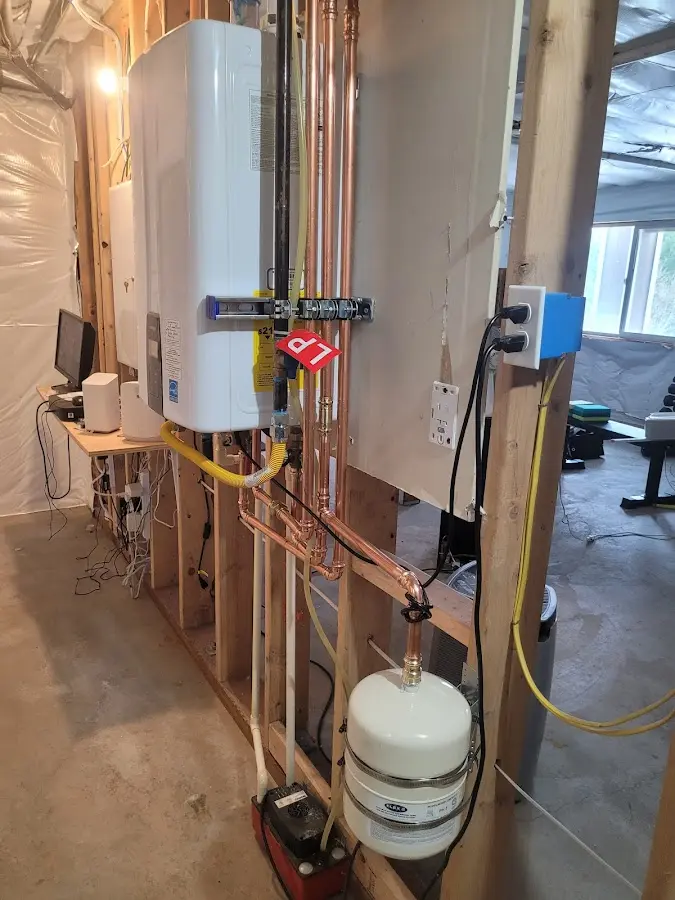 Licensed plumber repairing a kitchen sink in Lihue